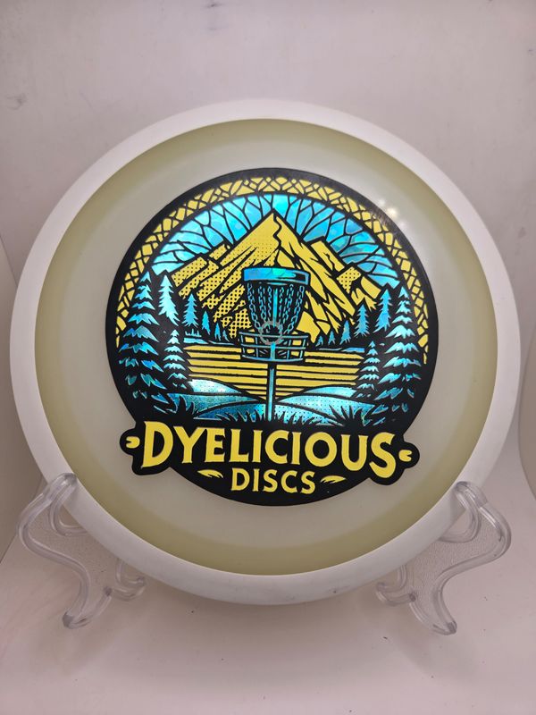 MVP Discs Eclipse Green Orbital Triple Foil 1 of 1 Dyelicious Discs Stamp with Blue Flower background with Yellow 175g