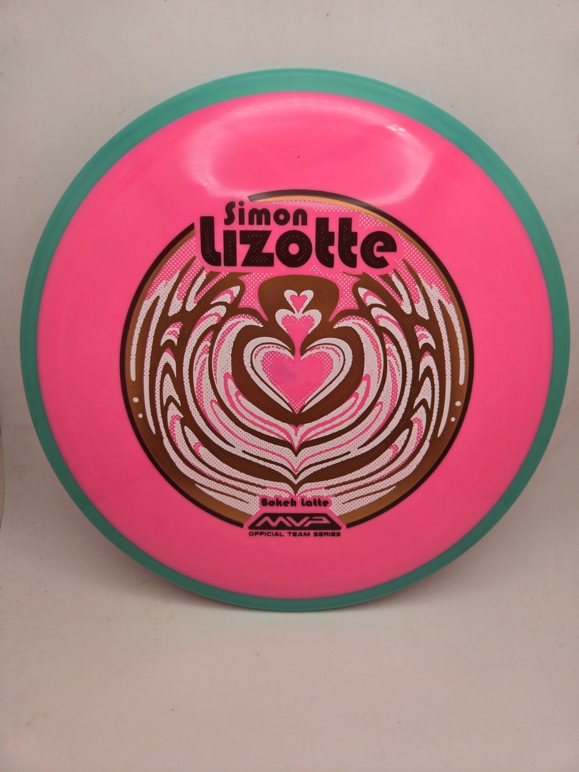 Axiom Neutron Bokeh - Simon Lizotte Team Series Pink Plate Teal Rim 169g