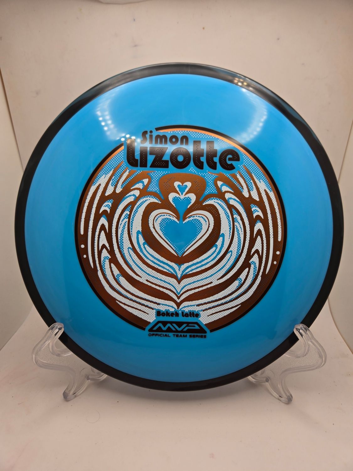Axiom Neutron Bokeh - Simon Lizotte Team Series Swirly Blue Plate Swirly Black/Blue Rim 175g