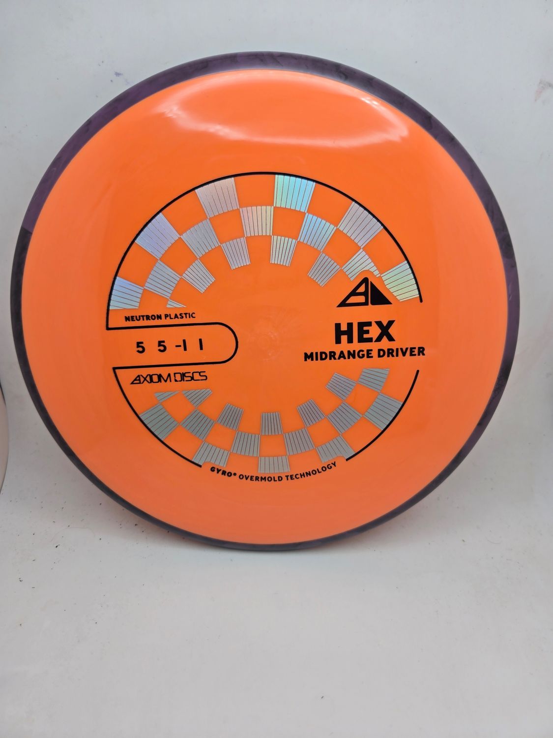 Axiom Discs Hex Neutron Soft Orange with Swirly Black/Purple Rim 177g