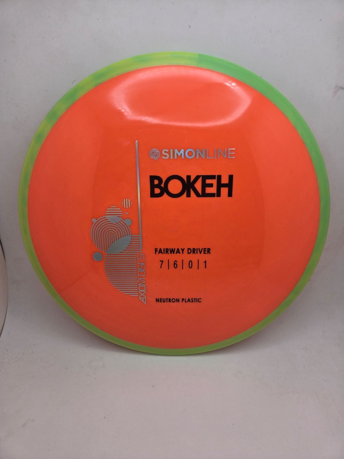 Axiom Neutron Bokeh - Stock Orange with Green Rim 172g