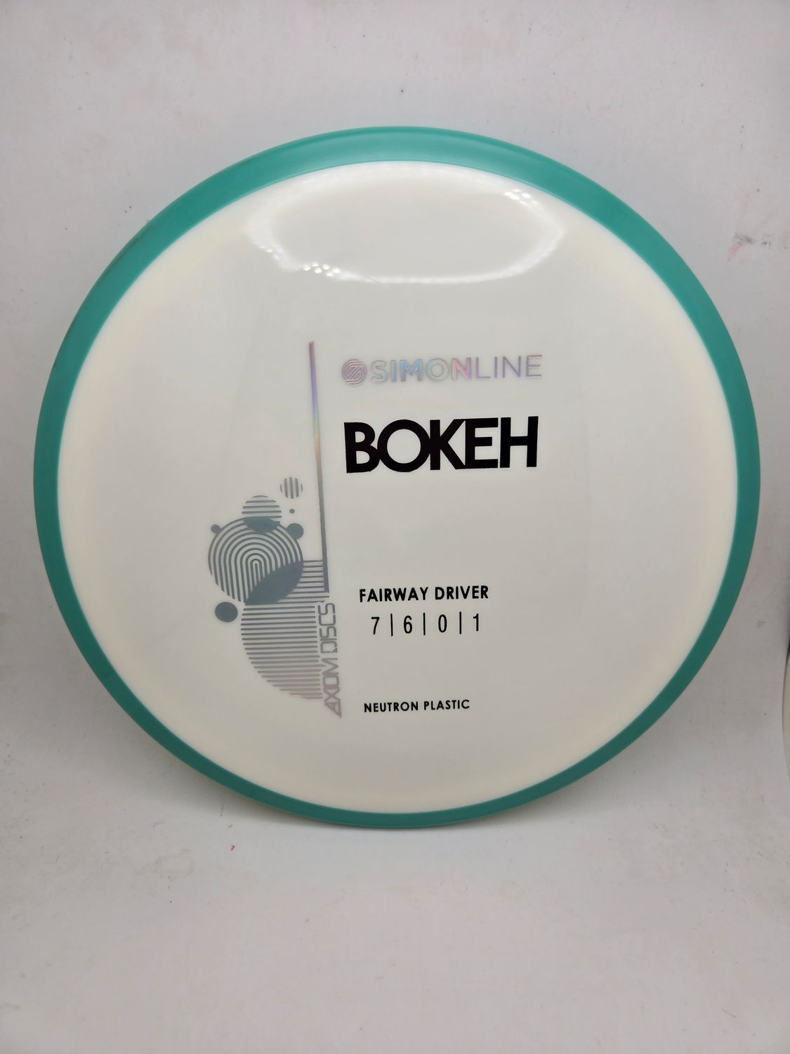 Axiom Neutron Bokeh - Stock White with Teal Rim 167g