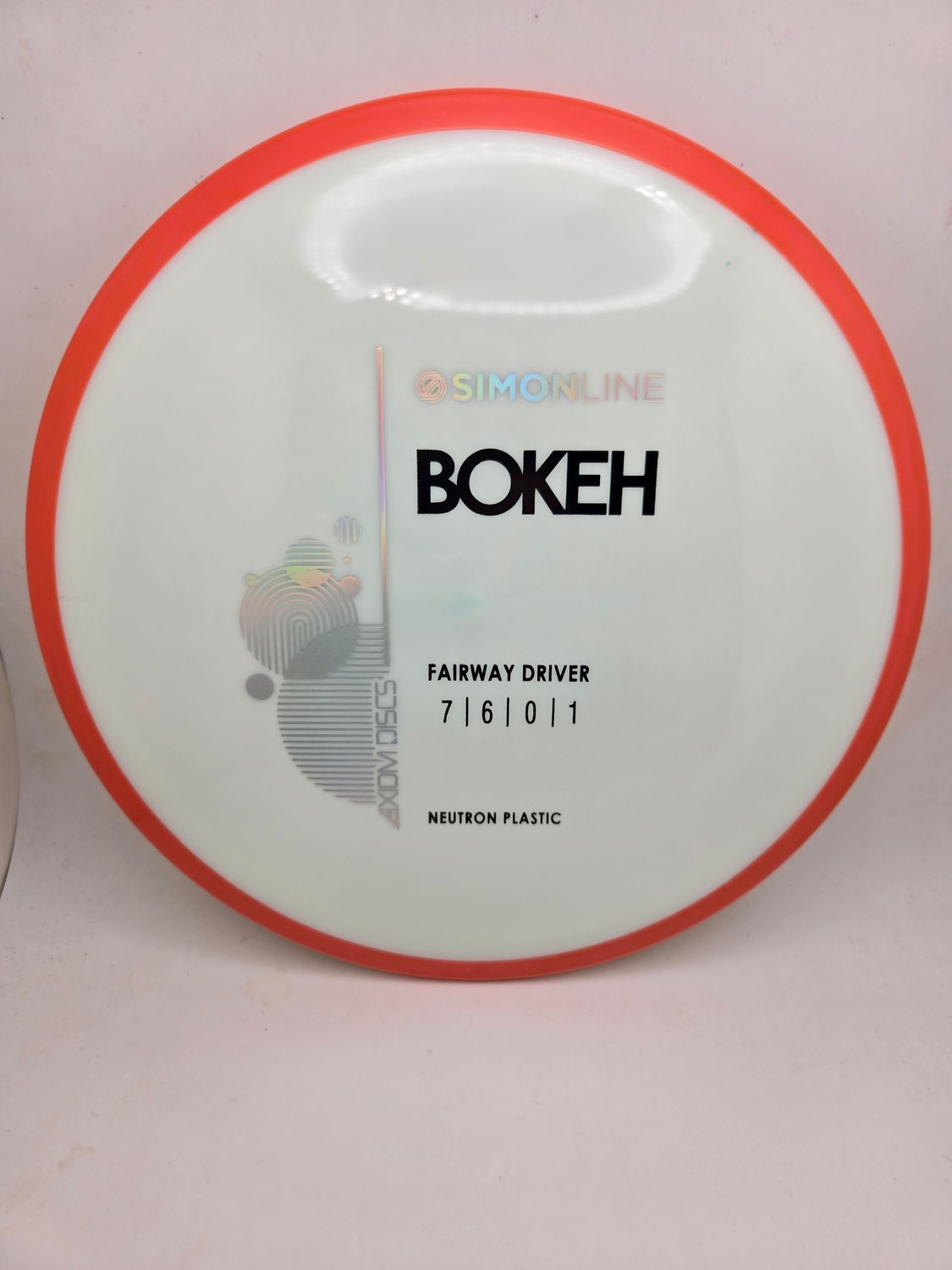 Axiom Neutron Bokeh - Stock White with Orange Rim 166g