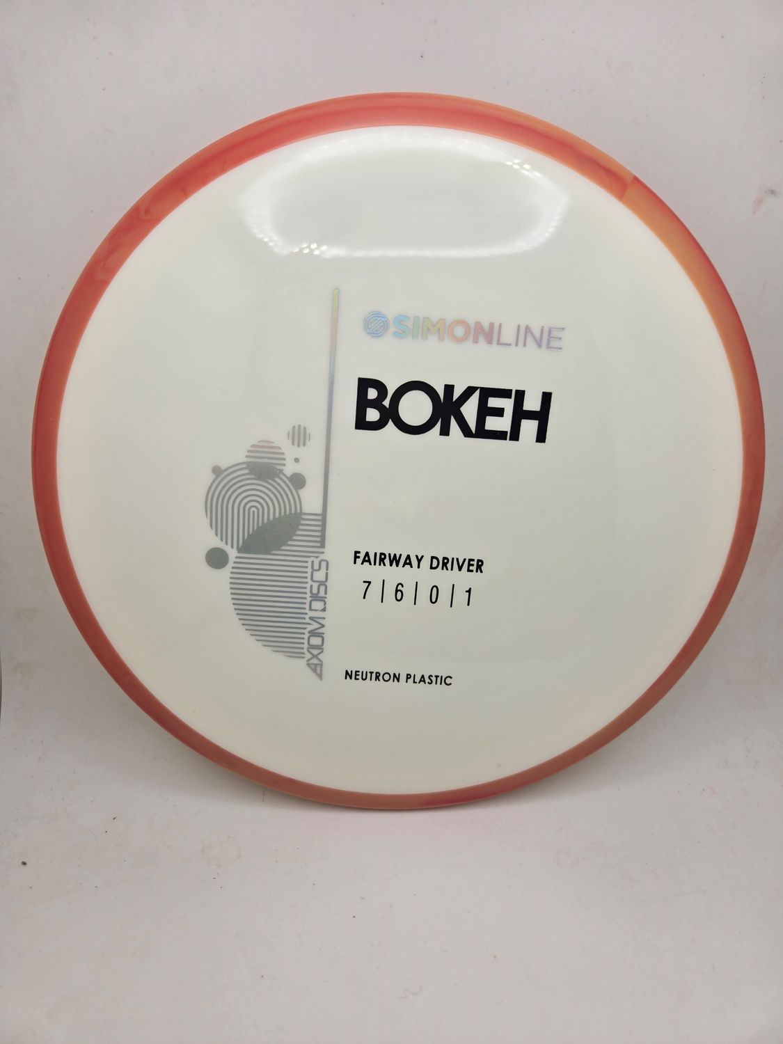 Axiom Neutron Bokeh - Stock White with Orange Rim 171g
