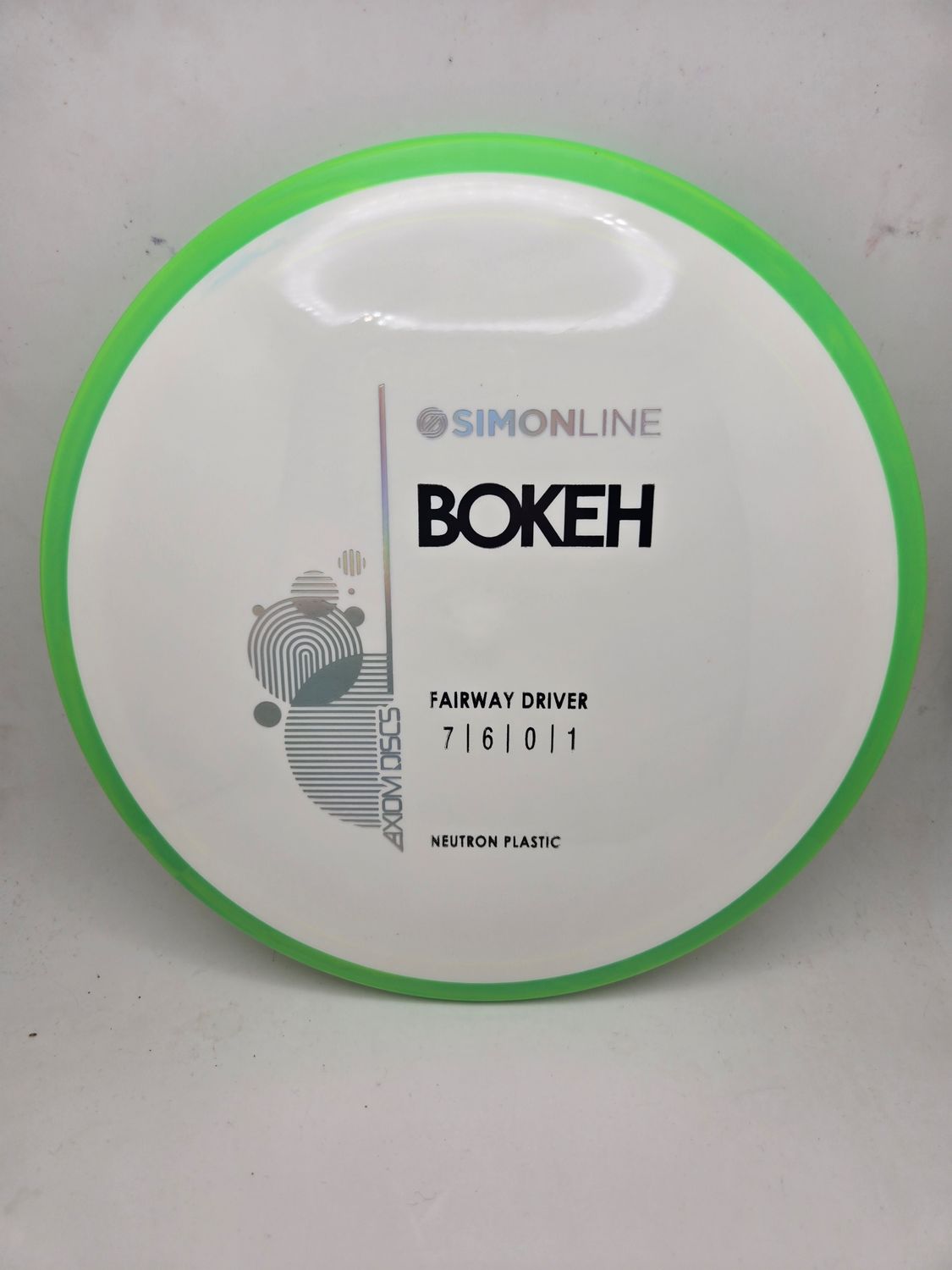 Axiom Neutron Bokeh - Stock White with Dayglow Green Rim 166g