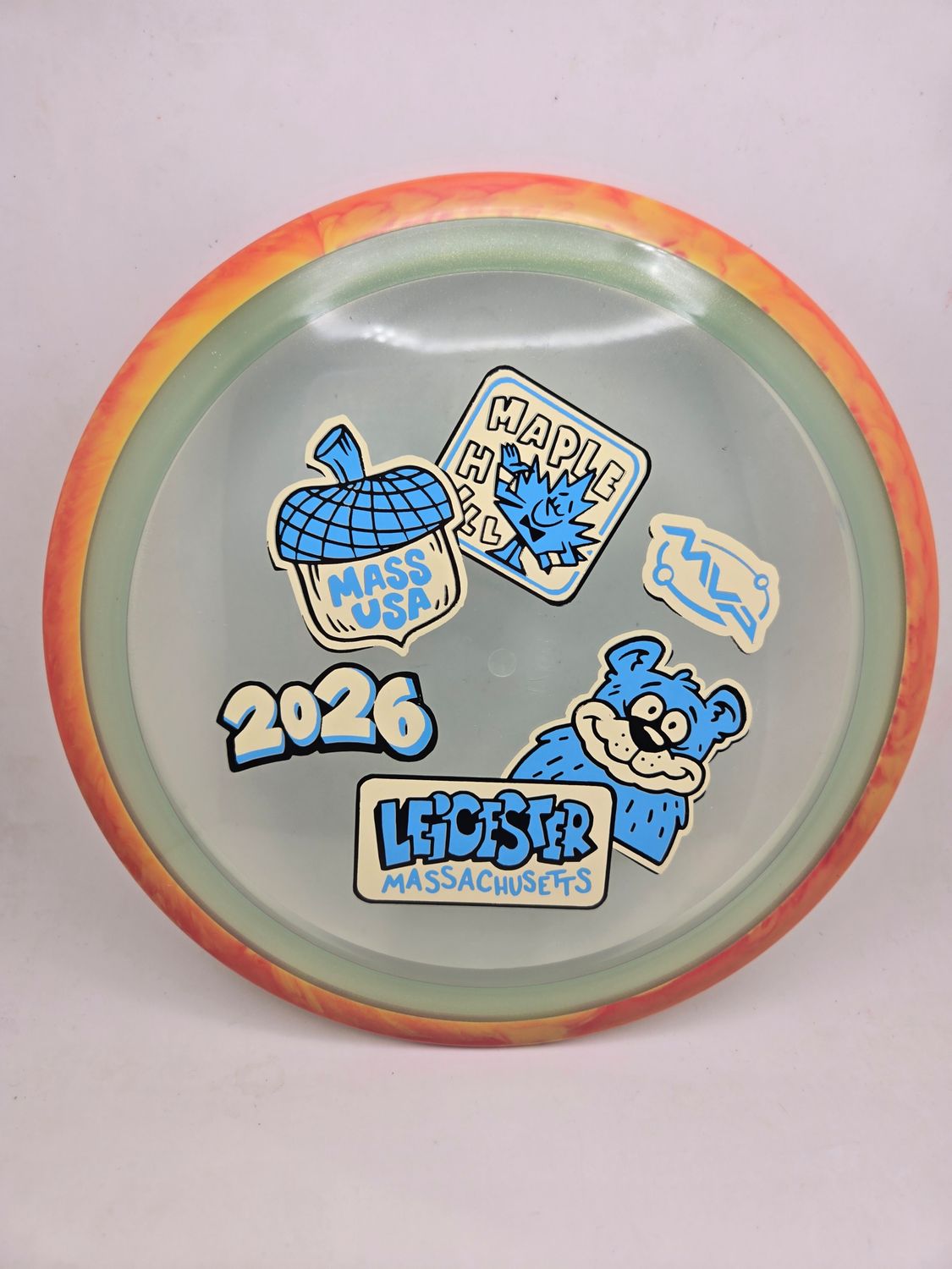 Axiom Discs MVP OPEN 2026 Proton Aspect Clear Teal with Swirly Orange/Yellow Rim 170g