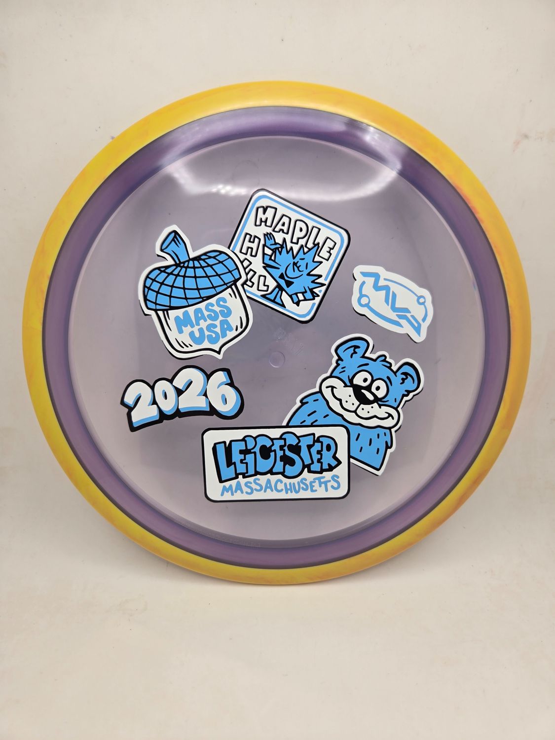 Axiom Discs MVP OPEN 2026 Proton Aspect Purple with Swirly Yellow/Orange Rim 173g