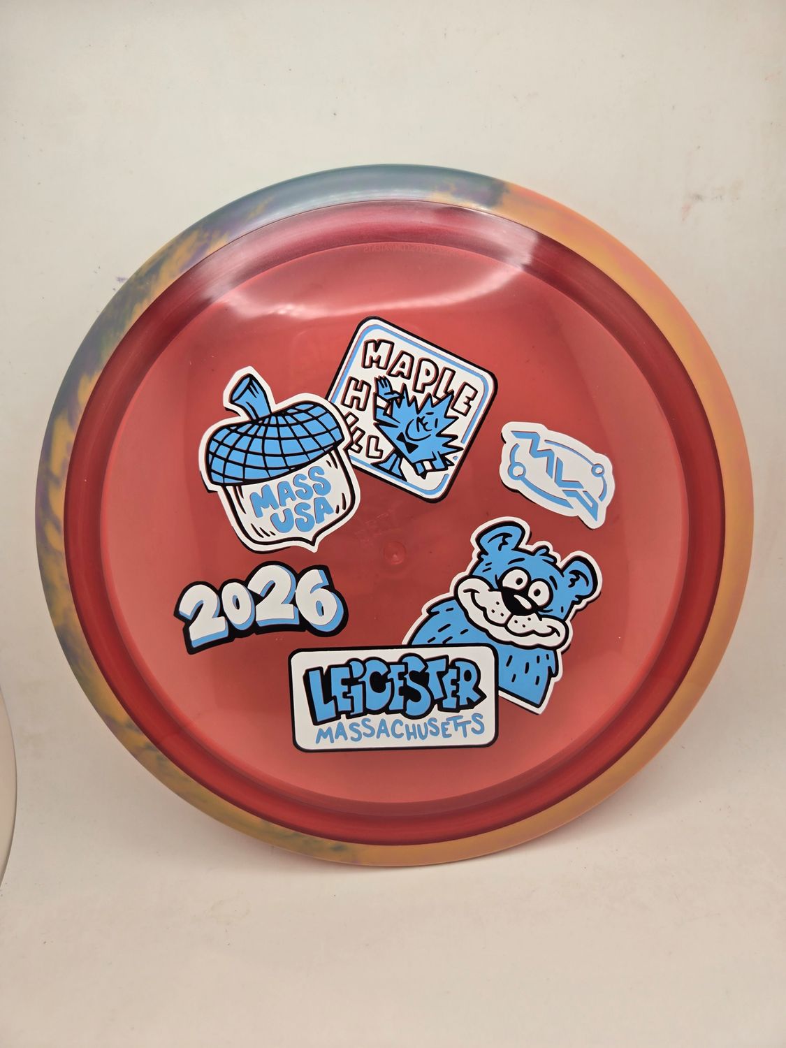Axiom Discs MVP OPEN 2026 Proton Aspect Watermelon Red with Swirly Orange/Purple Rim 175g
