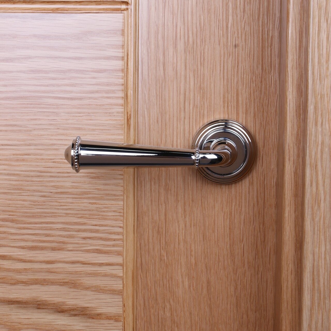 Manilla para puerta Palline 533.
Juego roseta redonda