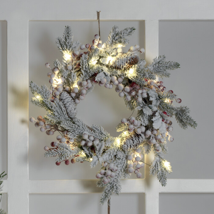 Ghirlanda tonda innevata con bacche e luce led - Mascagni Ghirlanda tonda innevata con bacche e luce led - Mascagni