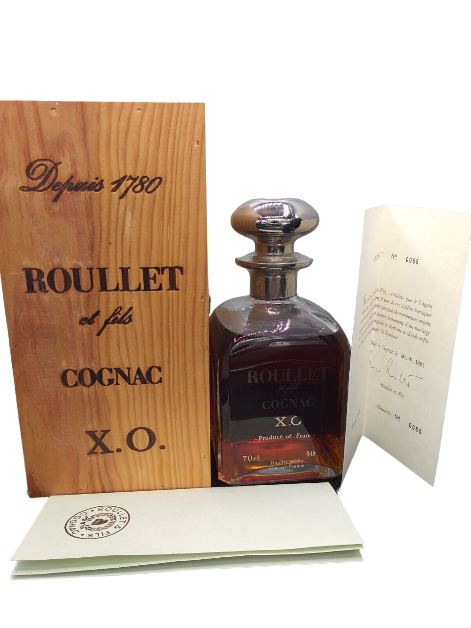 Roullet et fils X.O. Cognac 40% VOL. (1x0,7ltr.) Zertifikat 01/1991 Nr. 0086 Holzkiste
