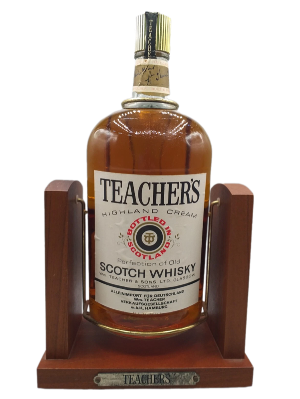 Teacher's Highland Cream Scotch Whisky 43% VOL. (1x1,89tr.) Henkelflasche inkl. Holz-Flaschenwiege Teacher's Highland Cream Scotch Whisky 43% VOL. (1x1,89tr.) Henkelflasche inkl. Holz-Flaschenwiege