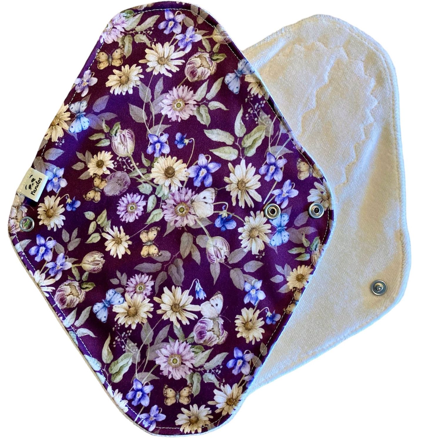 Compresa de tela Pandos - Talla M - Flores sobre morado Compresa de tela Pandos - Talla M - Flores sobre morado