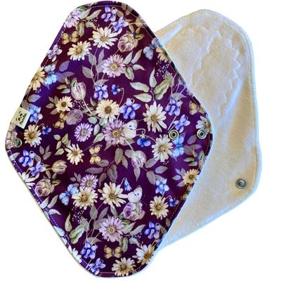 Compresa de tela Pandos - Talla M - Flores sobre morado Compresa de tela Pandos - Talla M - Flores sobre morado