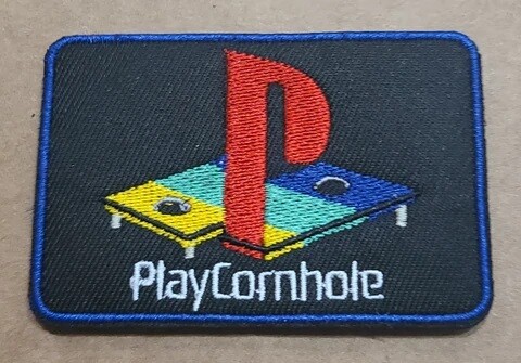 PLAY CORNHOLE