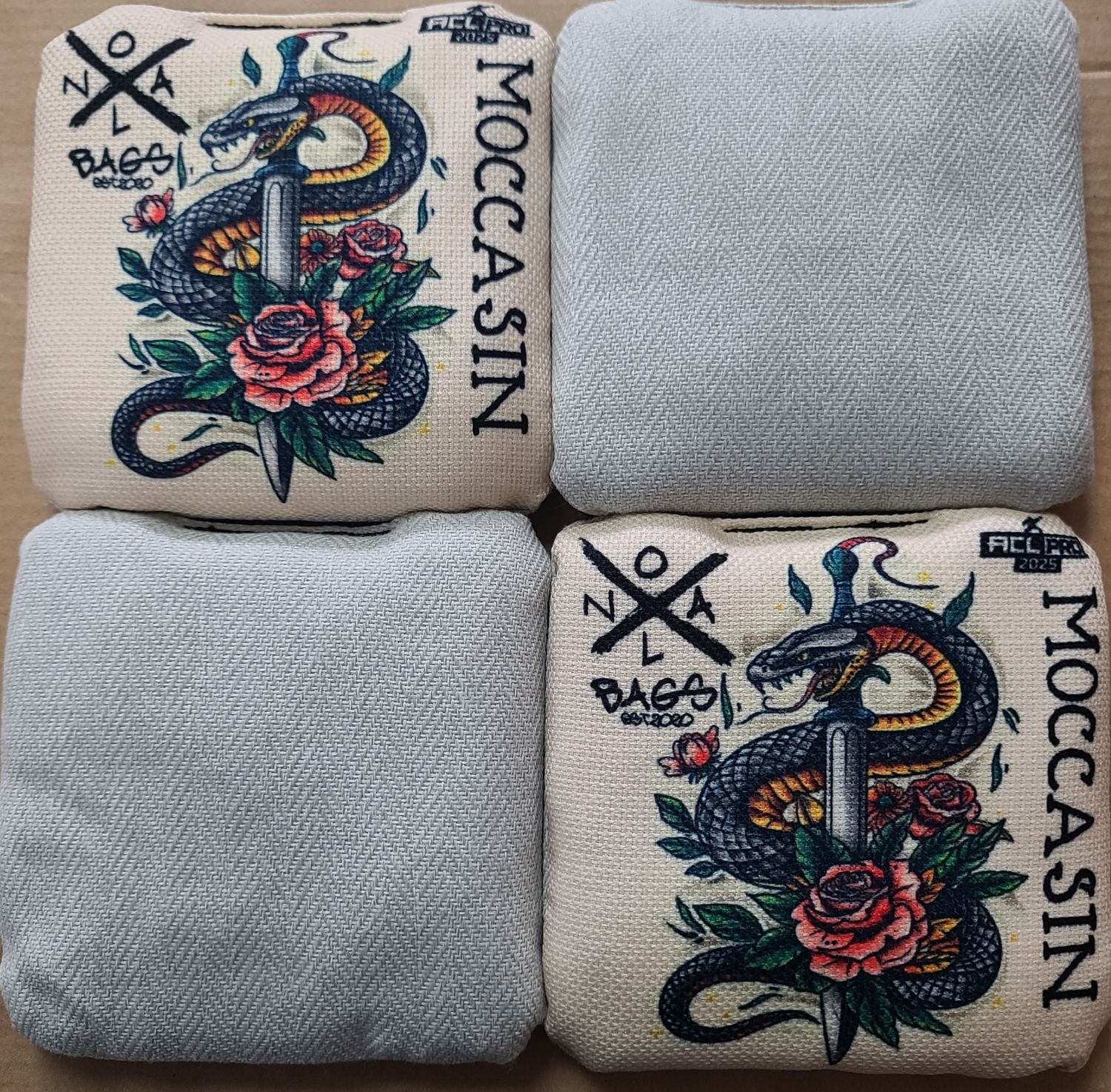 MOCCASIN '25 SNAKE/SWORD