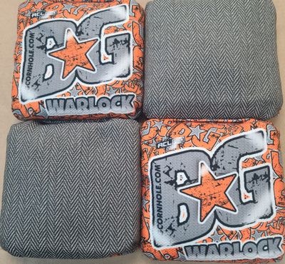 WARLOCK '23 STICK W/BG ORANGE/GRAY