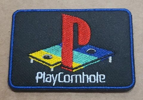 PLAY CORNHOLE
