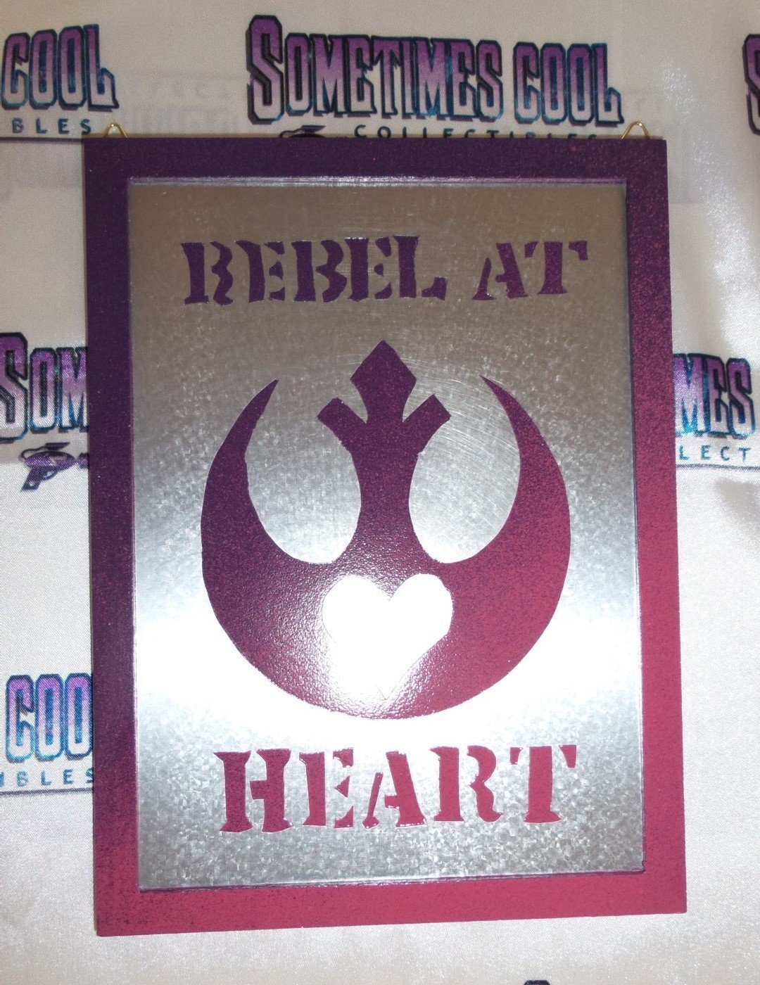 Rebel At Heart Tin Sign