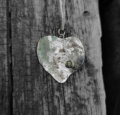 Peridot set silver leaf pendant