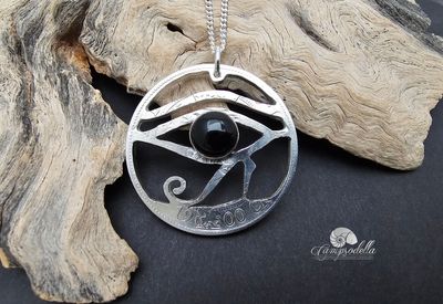 Eye of Ra -  Silver Half Crown coin with black onyx Eye of Ra -  Silver Half Crown coin with black onyx