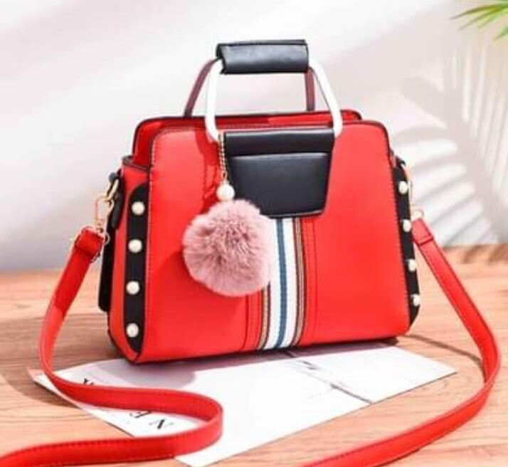 Red leather bags with side pearls