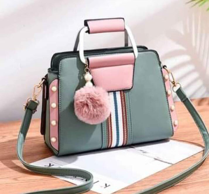 Green leather bag with side pearls