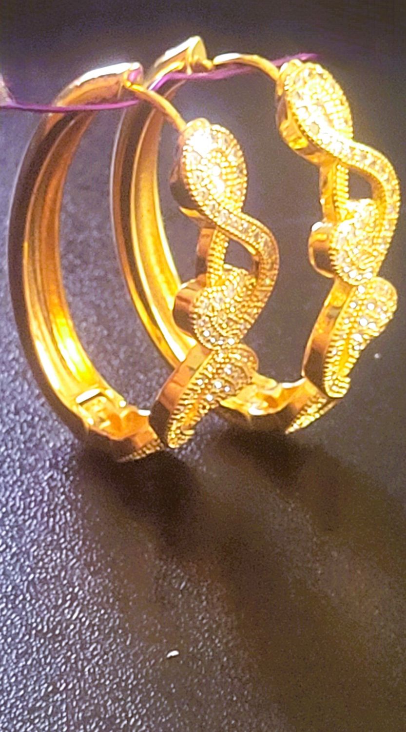Bronze Diamond Accent Twisted Hoop Earrings Plated Bronze Diamond Accent Twisted Hoop Earrings Length 1.7inch  41mm