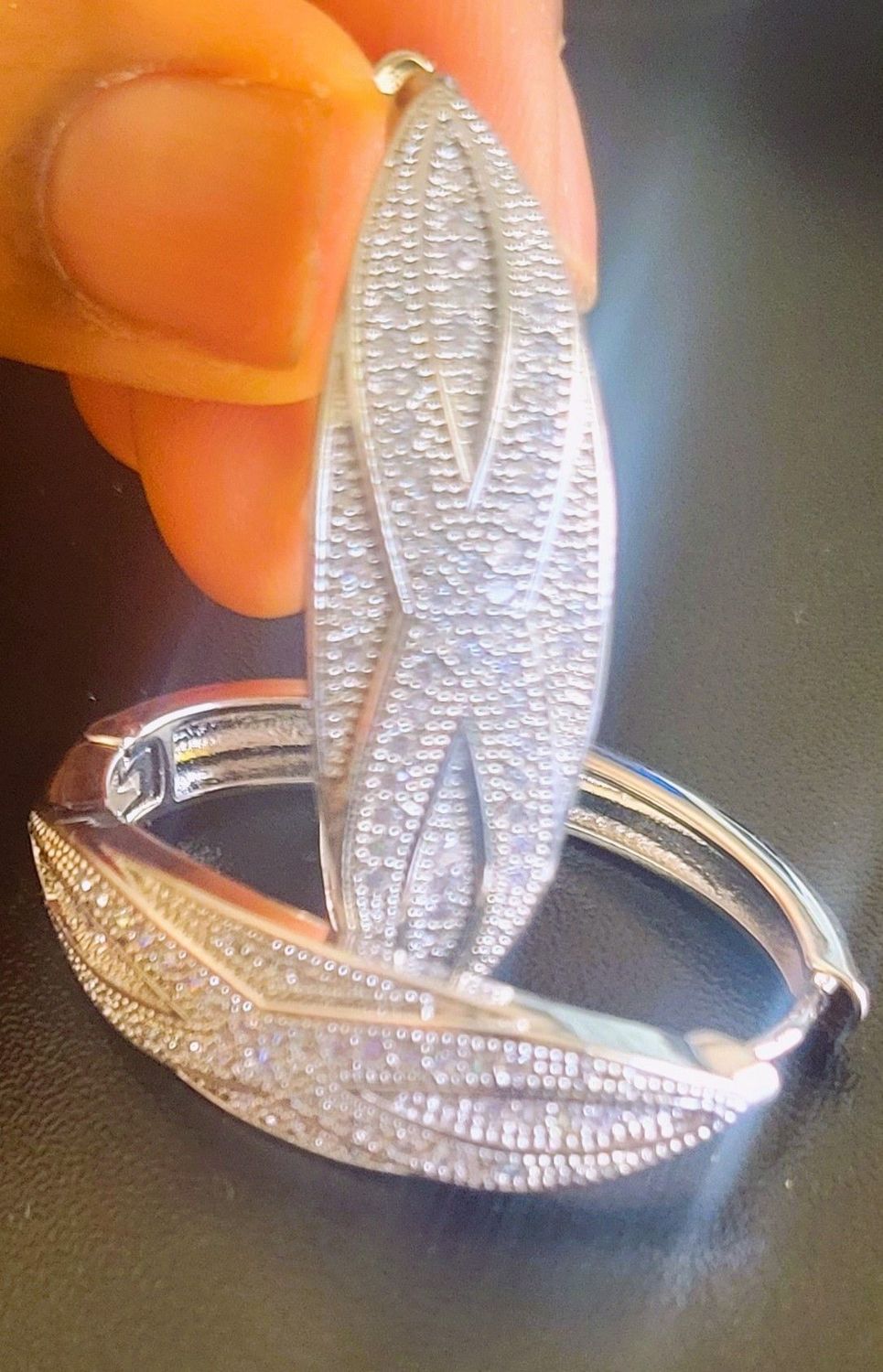 White Diamond Accent Twisted Hoop Earrings Plated Stoned Diamond Accent Twisted Hoop Earrings Length 1.8inch 45mm Twisted Hoop Earrings Width 1.1 INCH 27 MM