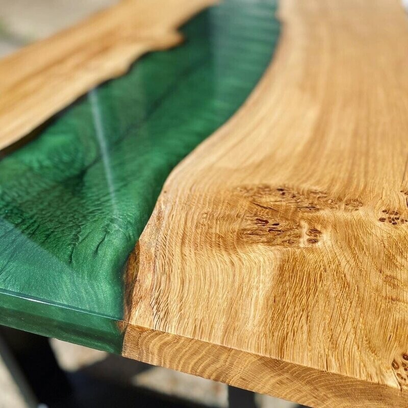 Oak coffee table with dark green resin river