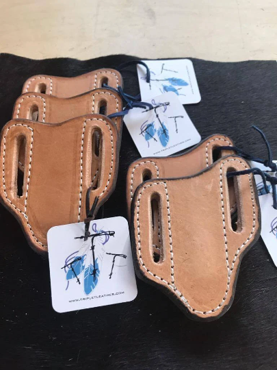Knife sheath/holster. Solid leather, pancake sheath, smooth finish.