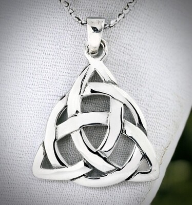 Sterling silver triquetra necklace featuring the Celtic symbol of eternal life and spiritual protection, beautiful gift.