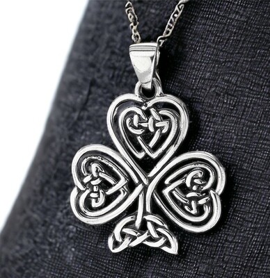 Sterling silver Irish shamrock pendant necklace with intricate Celtic knot design, celebrating Irish heritage.