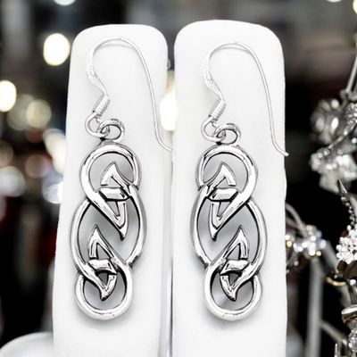 Celtic Knot Silver Earrings - Mor Sterling silver Celtic knot weave earrings celebrating timeless Celtic symbolism and heritage. Shown on earrings holder.
