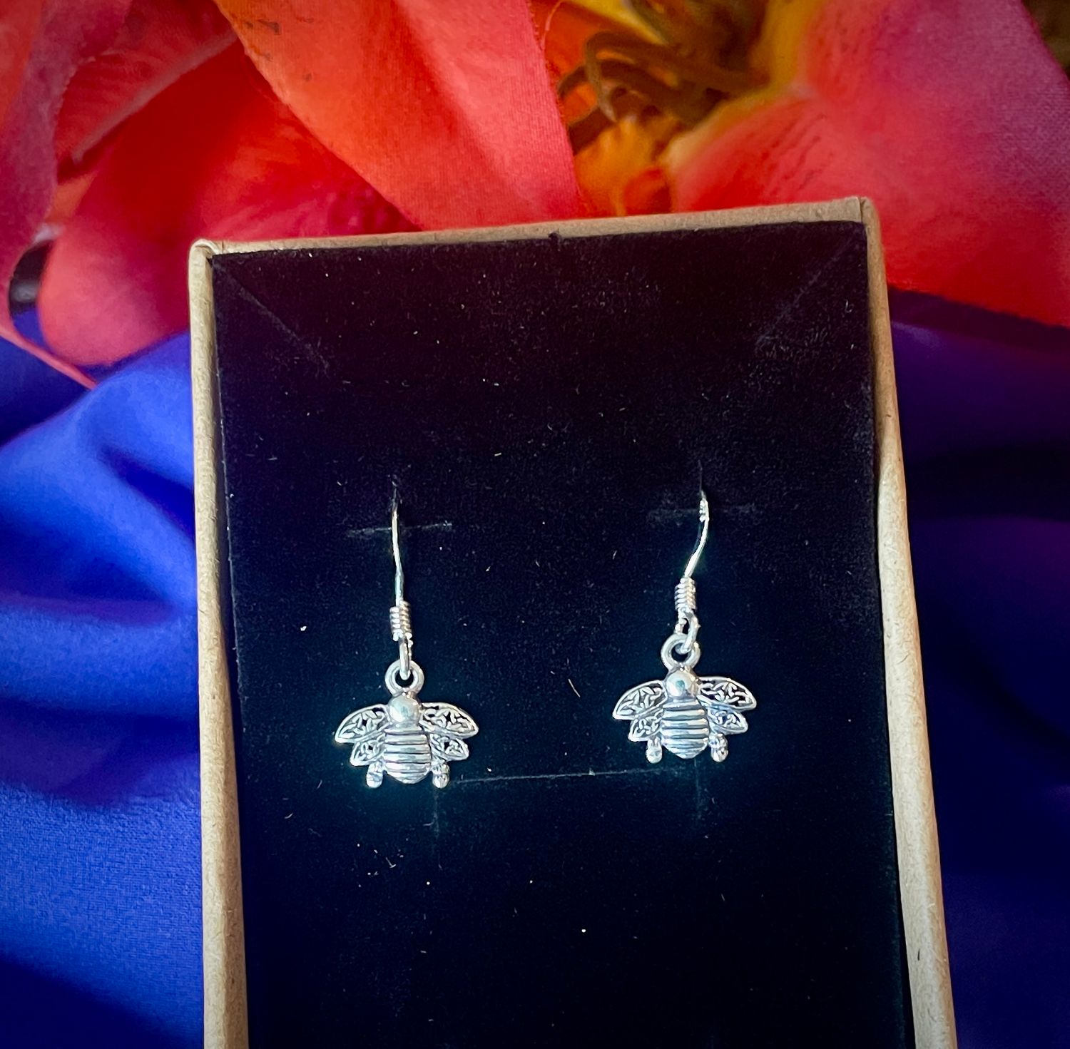 Sterling silver Outlander-inspired bee earrings with Celtic design, handcrafted Celtic jewelry shown in jewelry box. 