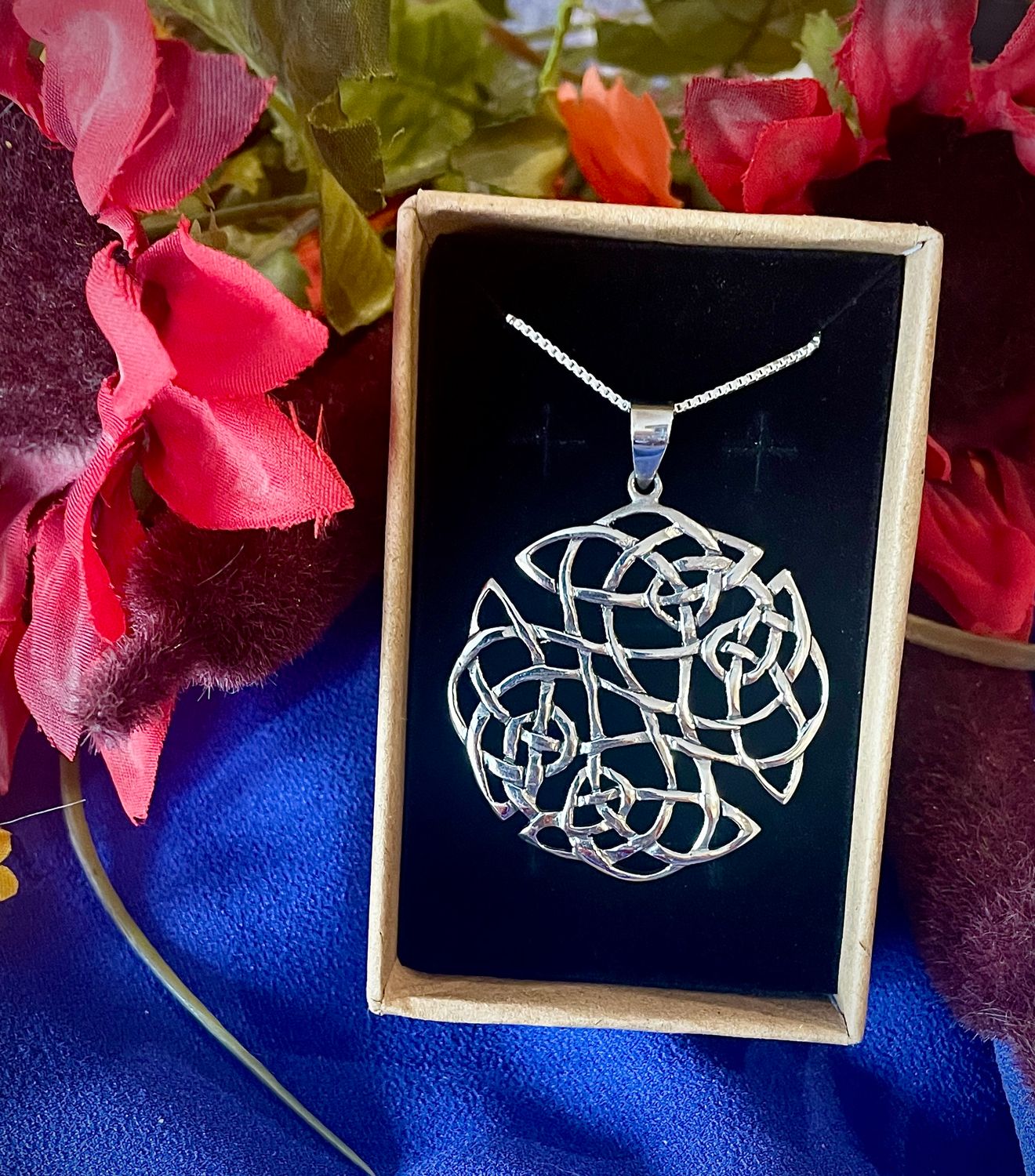 Celtic Knot -Mor Large sterling silver Celtic knot pendant, symbolic jewelry representing eternity and interconnectedness, in jewelry box.