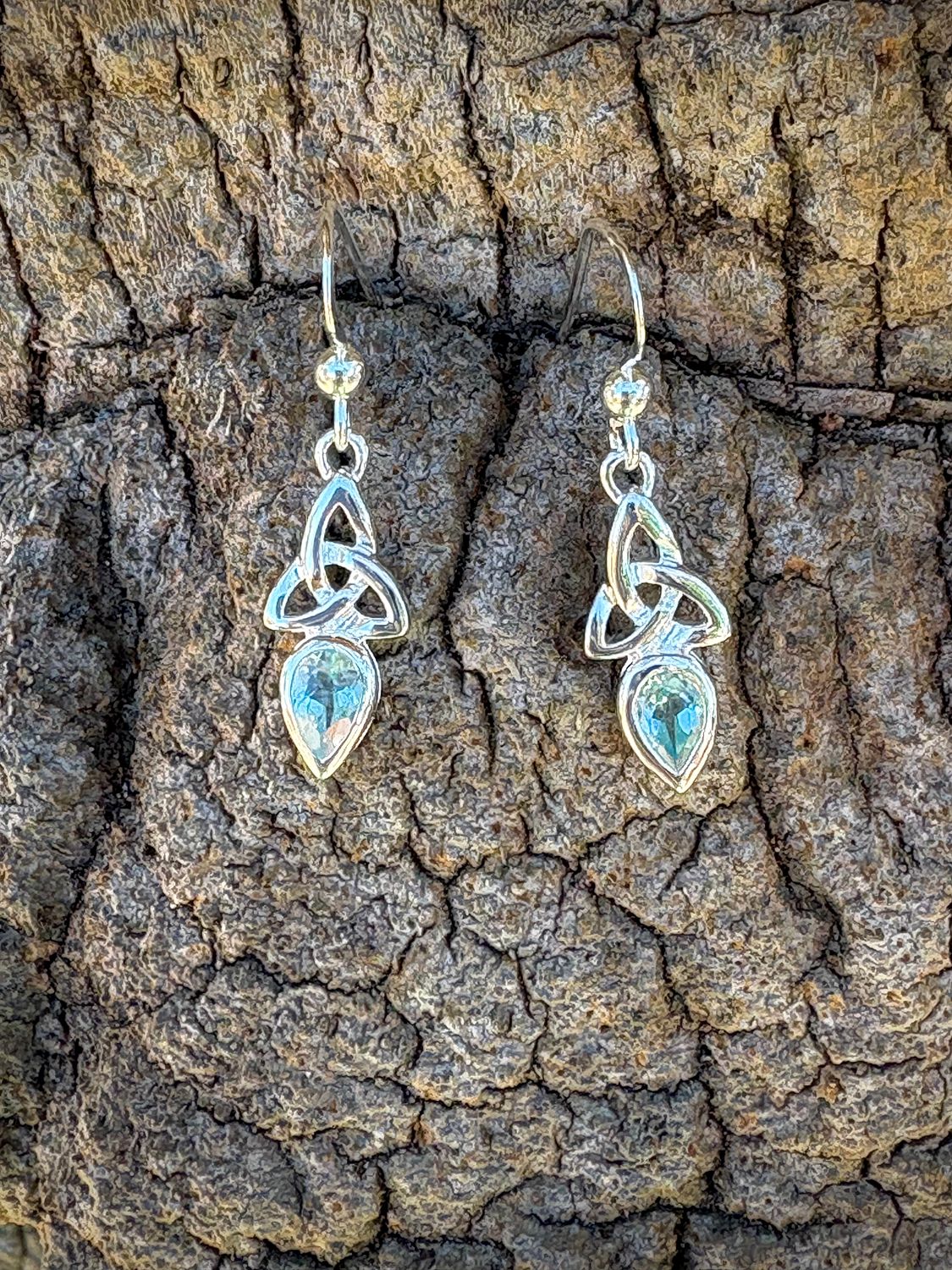 Trinity Knot Drop Earrings with Blue Topaz Sterling silver Trinity Knot earrings with blue topaz December birthstones, Celtic jewelry symbolizing unity.