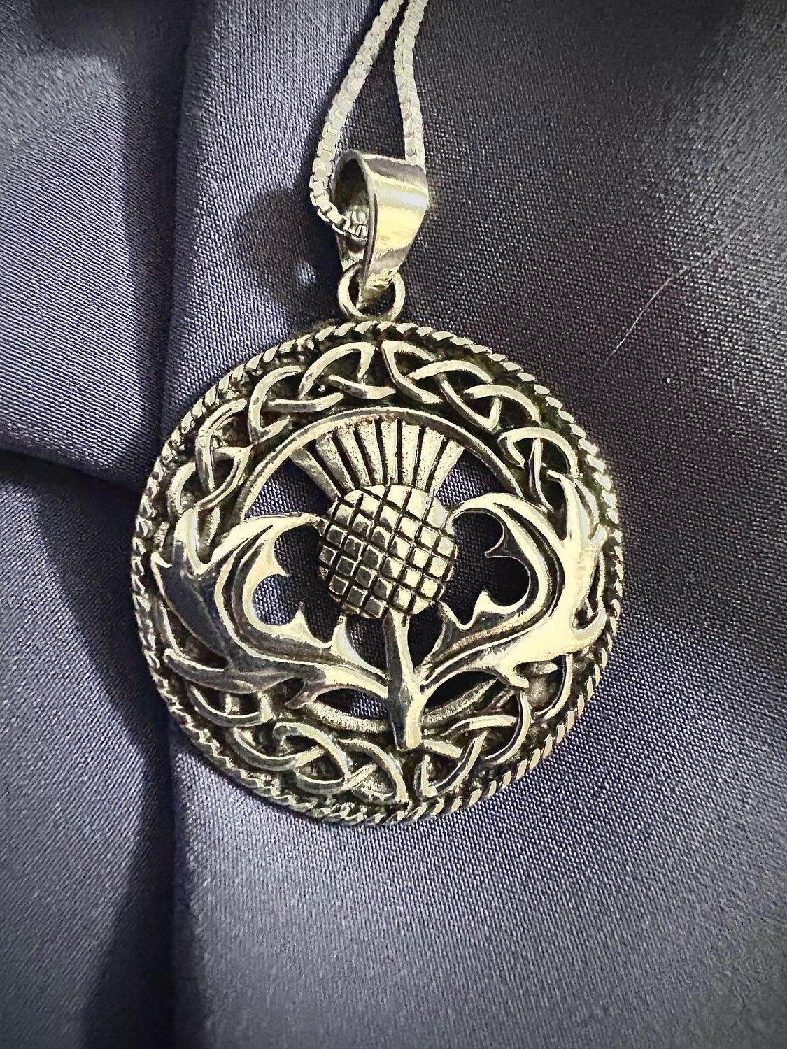 Scottish Thistle and Celtic Knotwork Sterling silver Scottish thistle pendant necklace in .925 silver, symbolizing Scottish heritage and pride.