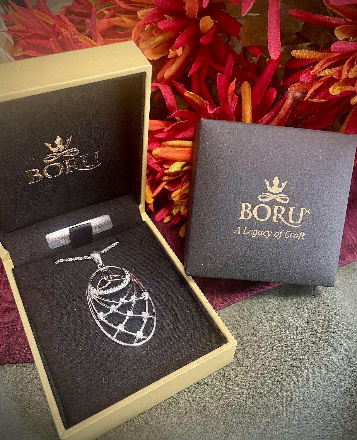 Sterling Silver Interlaced Celtic Pendant Necklace with CZ Stones and Rose Plated Trinity Knot.