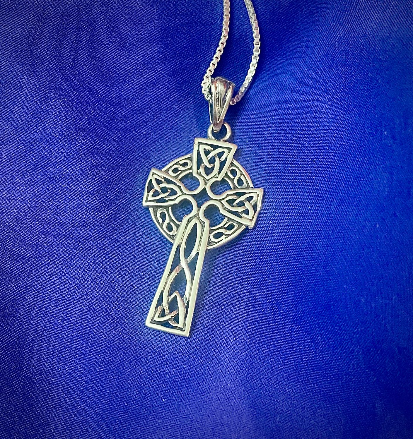 Celtic cross necklace in sterling silver with intricate knotwork design, perfect for Celtic culture lovers.