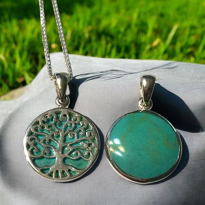 Sterling silver double-sided Celtic Tree of Life pendant with synthetic turquoise, handcrafted Celtic jewelry.