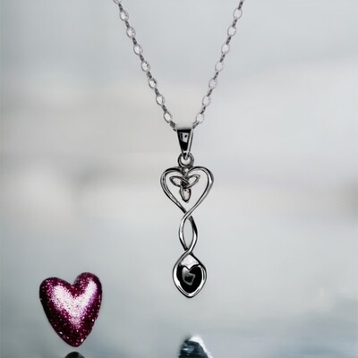Welsh Love Spoon Pendant - Dwynwen Sterling Silver Welsh Love Spoon Pendant with Trinity Knot, shown by a pink heart.
