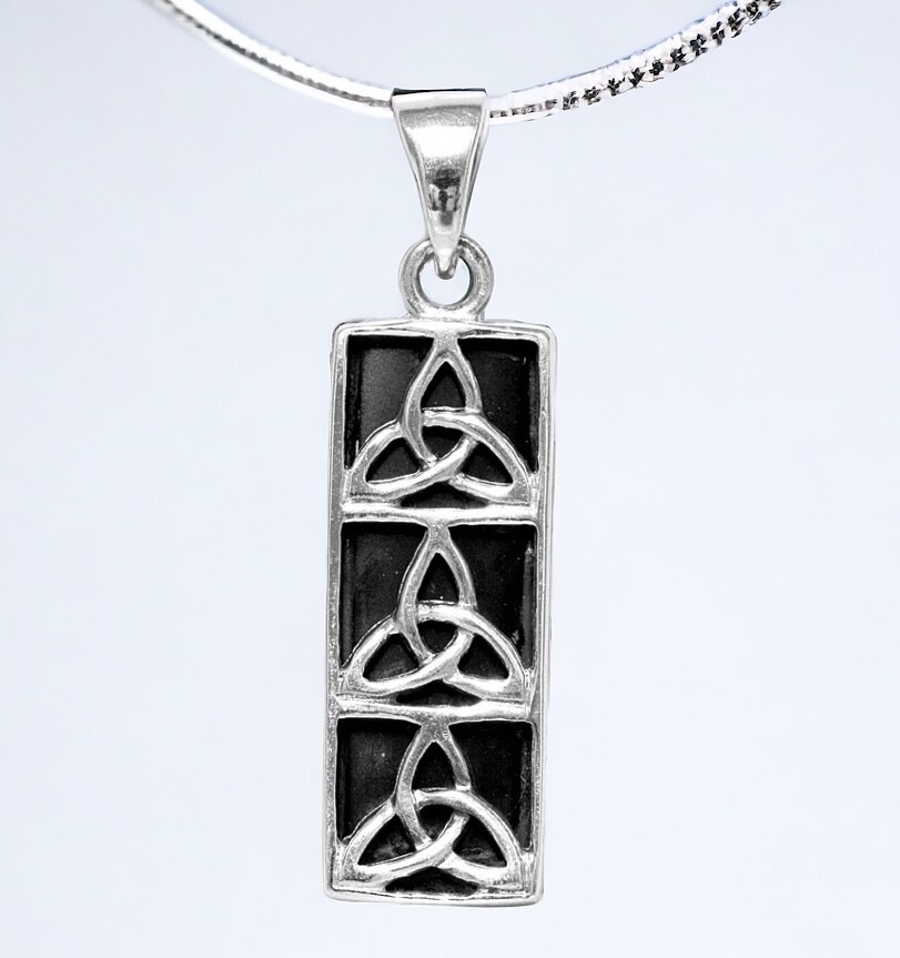Three Vertical Trinity Knots