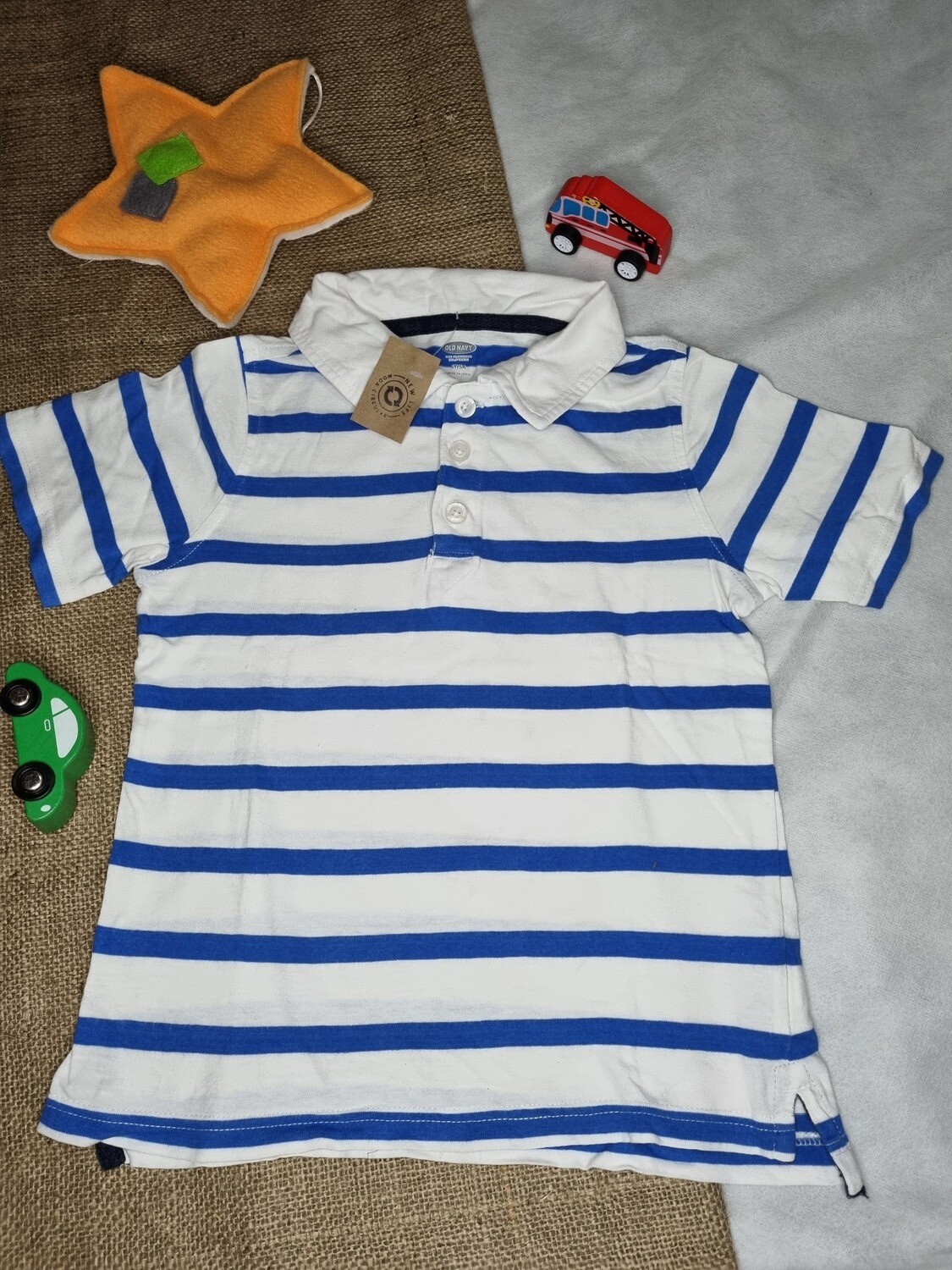 REMERA CUELLO POLO, MANGA CORTA, BLANCA CON RAYAS AZUL CLARO, MARCA OLD NAVY, TALLE 5A