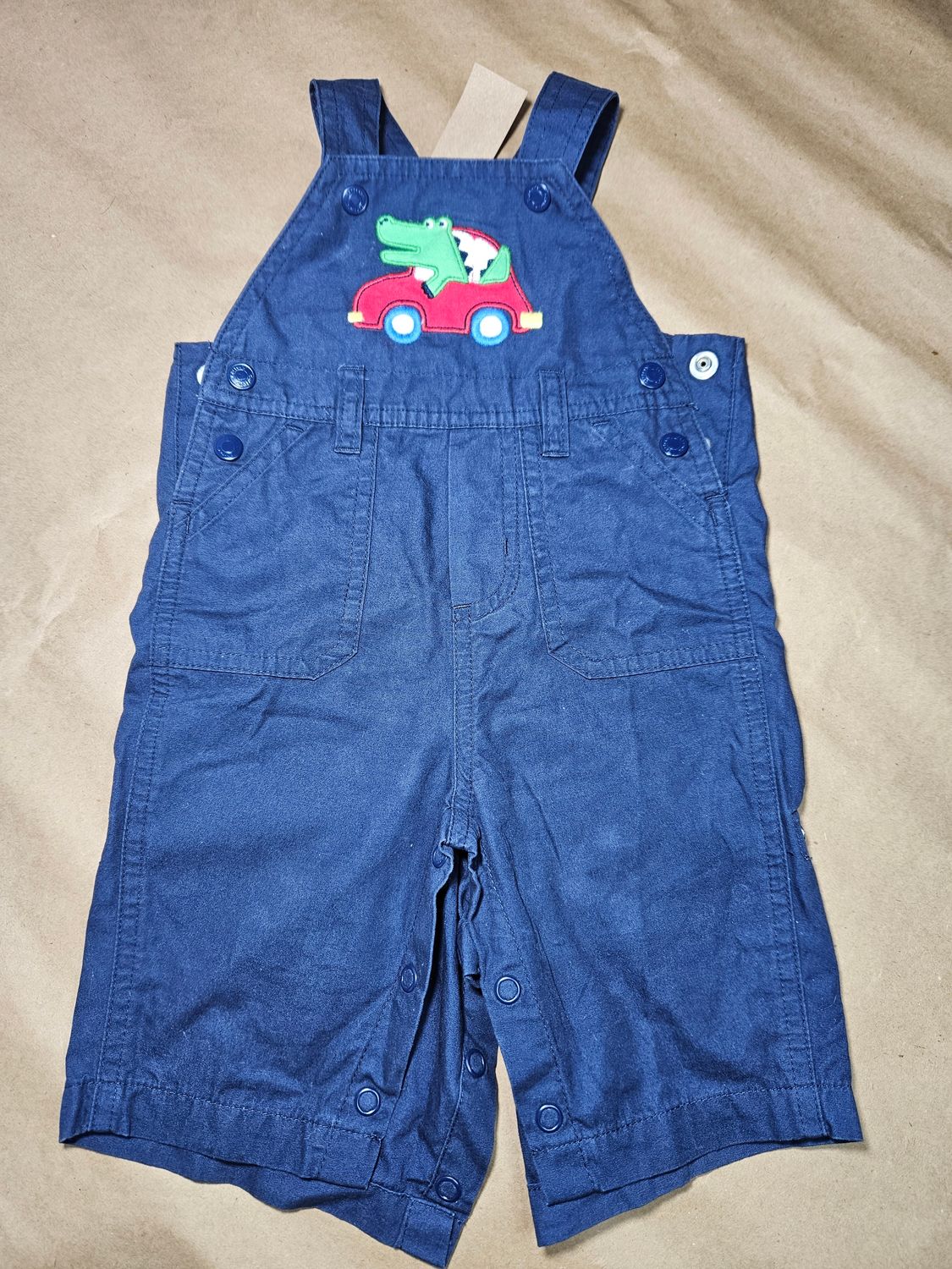 ENTERITO PAÑALERO PARA NIÑO TALLE 3 MESES, MARCA CARTERS. COLOR AZUL CON BORDADO DE COCODRILO - IMPECABLE