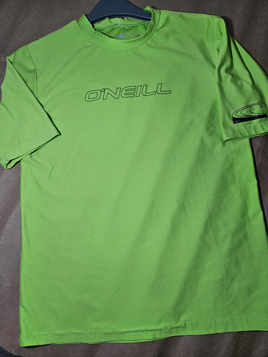 REMERA CON PROTECCIÓN UV + 50, MANGA CORTA. TALLE O&#39;NEILL. TALLE 14 - IMPECABLE SIN USO