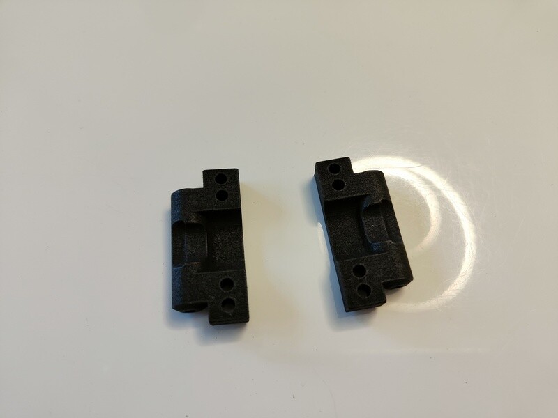 Team Associated RC10 rear arm mounts 4° toe (pair)