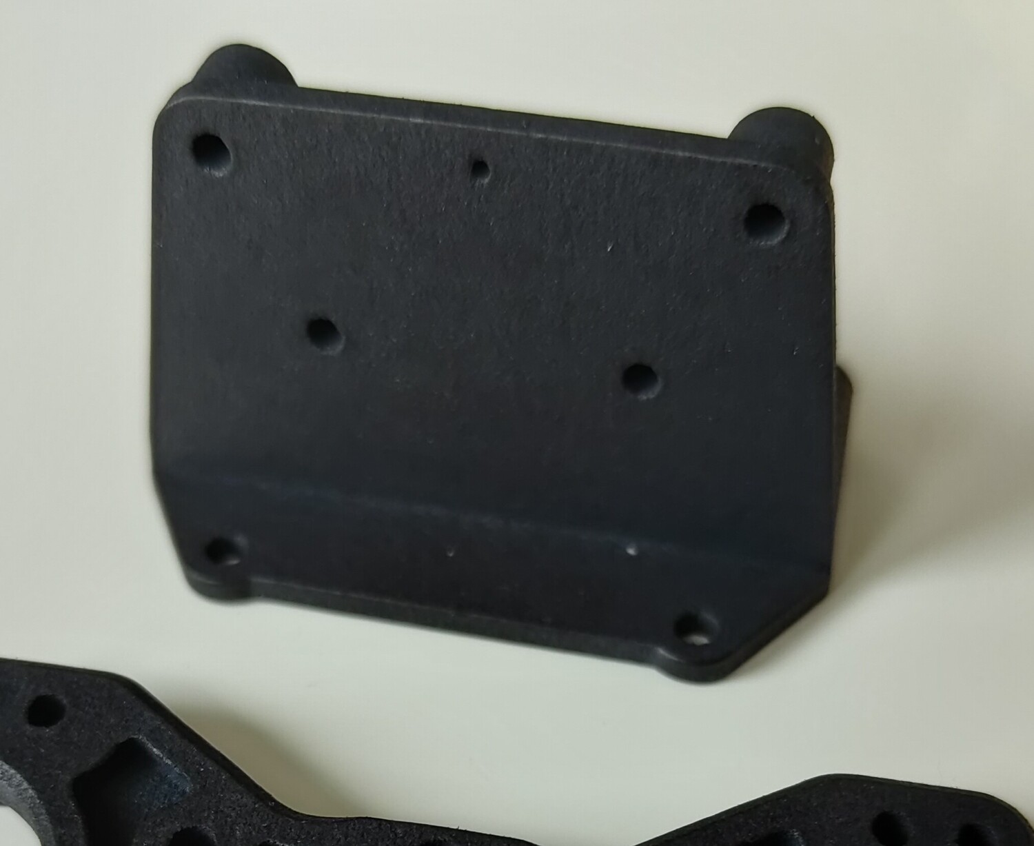 Tamiya Madcap rear shock tower mounting bracket