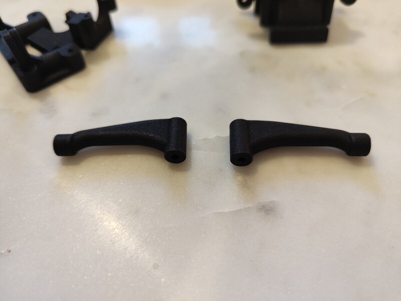 Yokomo Works 94-95 front upper arms, pair
