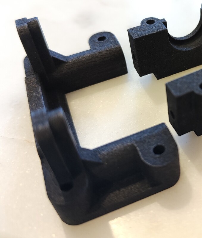 Yokomo Works 94-95 front lower arm mount